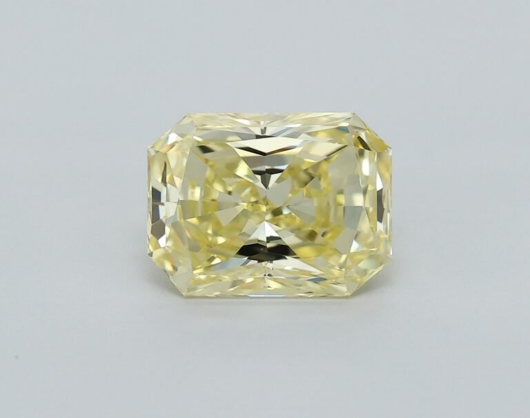 0.74 carat, Colour – Y5  Fancy Intense Yellow, Clarity – VVS2, Shape – Rectangular Radiant,  BDM