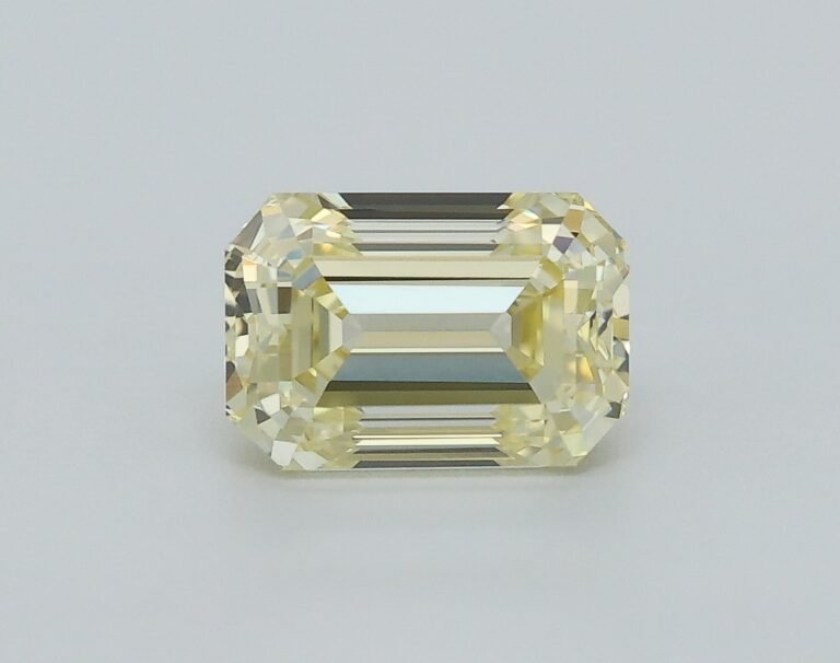 0.50 carat, Colour – Y3  Fancy Yellow, Clarity – VVS2, Shape – Rectangular Emerald,  BDM