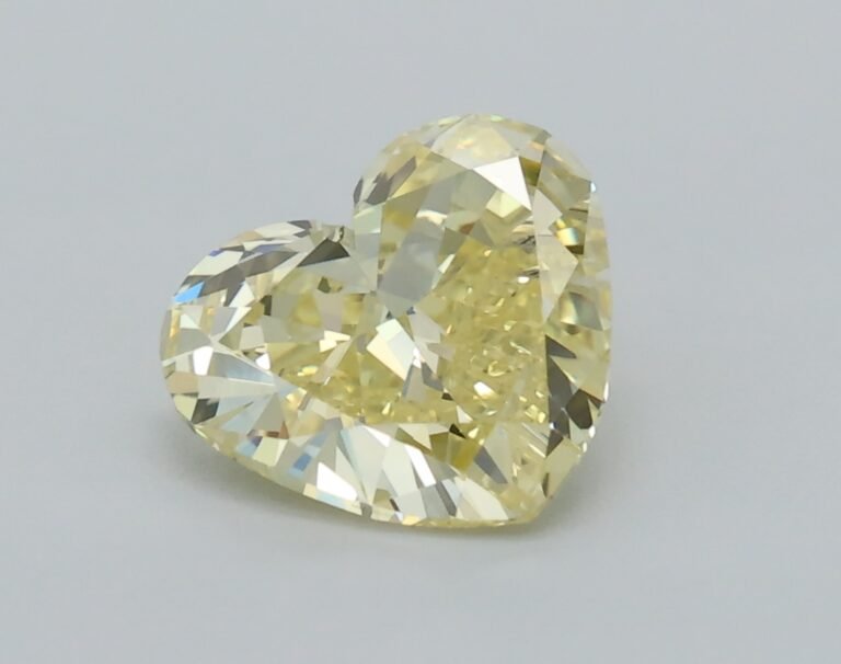 0.62 carat, Colour – Y5  Fancy Intense Yellow, Clarity – VS1, Shape – Heart,  BDM