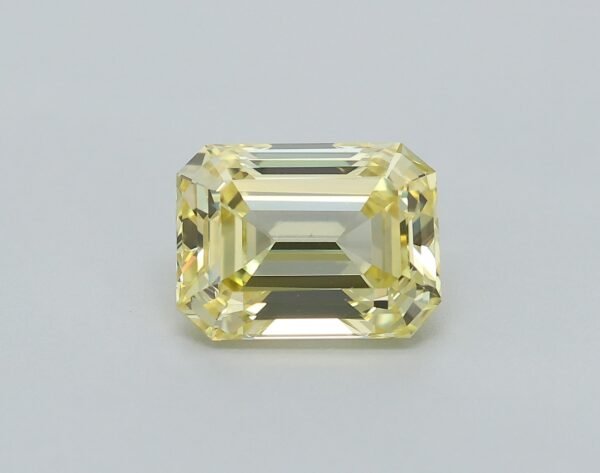 0.58 carat, Colour - Y5  Fancy Intense Yellow, Clarity - VS1, Shape - Rectangular Emerald,  BDM