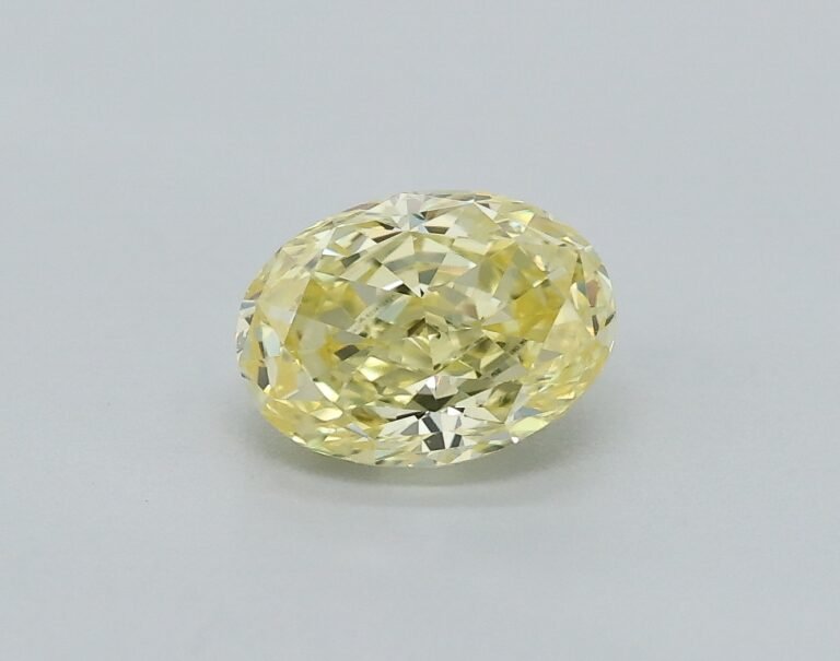 0.32 carat, Colour – Y4  Fancy Yellow, Clarity – VVS1, Shape – Modified Oval,  BDM