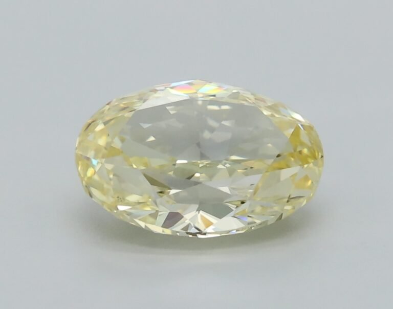 0.89 carat, Colour – Y3  Fancy Yellow, Clarity – VS1, Shape – Modified Oval,  BDM