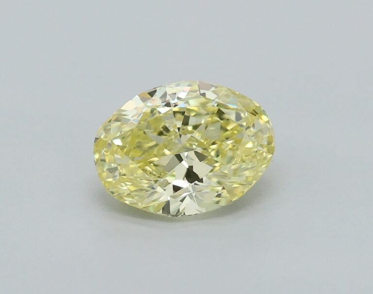 0.51 carat, Colour – Y3  Fancy Yellow, Clarity – VVS1, Shape – Modified Oval,  BDM