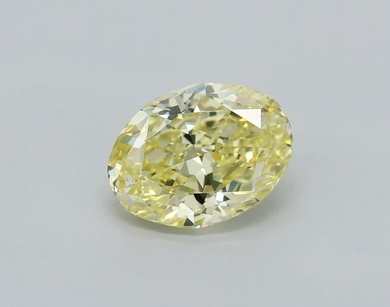 0.60 carat, Colour – Y4  Fancy Yellow, Clarity – VS1, Shape – Modified Oval,  BDM