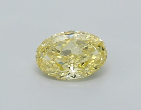 0.69 carat, Colour - Y5  Fancy Intense Yellow, Clarity - VS2, Shape - Modified Oval,  BDM