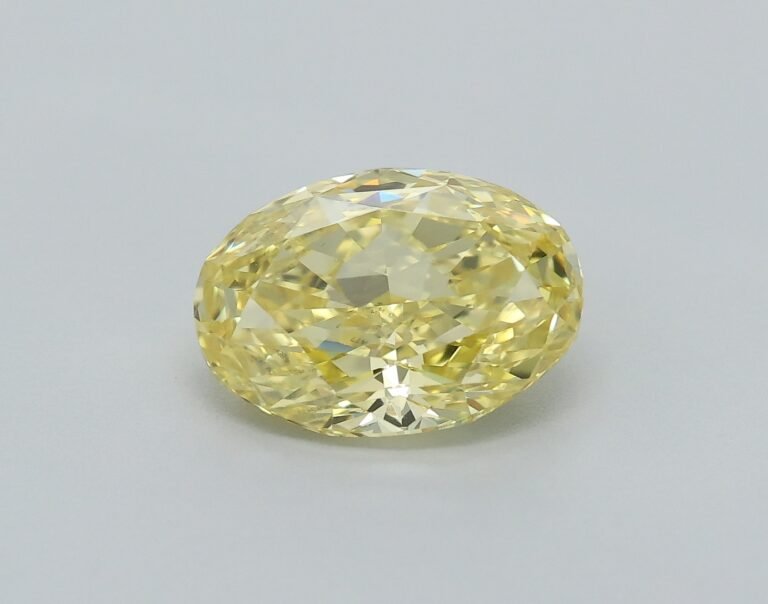 0.69 carat, Colour – Y5  Fancy Intense Yellow, Clarity – VS2, Shape – Modified Oval,  BDM