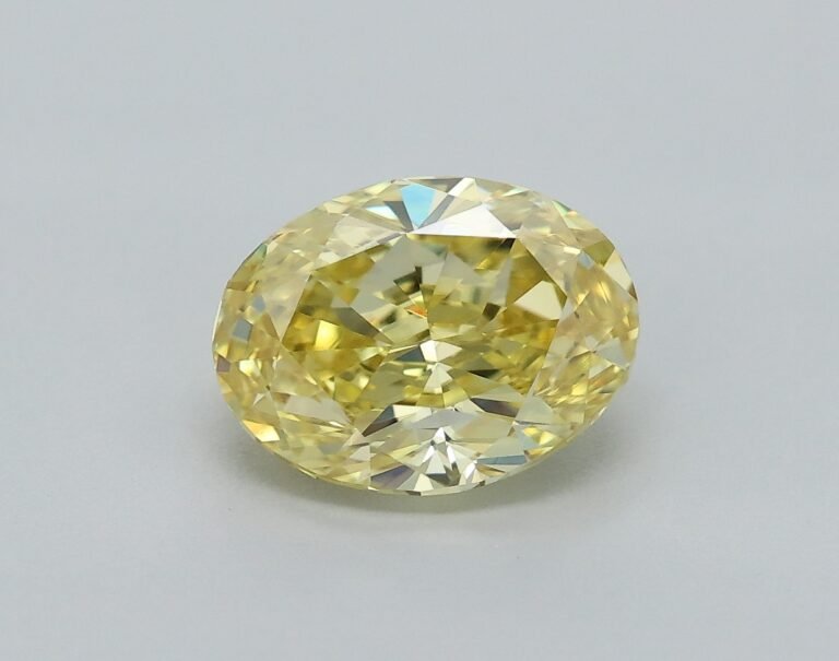 0.62 carat, Colour – Y6  Fancy Intense Yellow, Clarity – VVS2, Shape – Modified Oval,  BDM