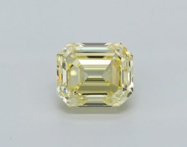 0.90 carat, Colour - Y5  Fancy Intense Yellow, Clarity - VVS1, Shape - Rectangular Emerald,  BDM