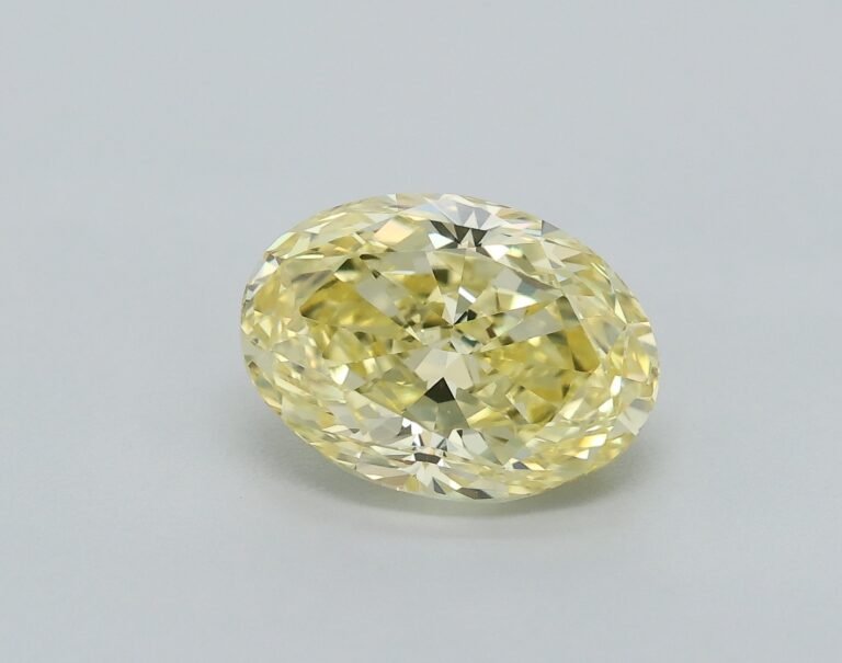 0.82 carat, Colour – Y5  Fancy Intense Yellow, Clarity – VVS2, Shape – Modified Oval,  BDM