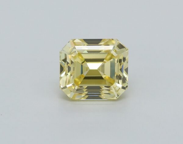 0.76 carat, Colour - Y5  Fancy Intense Yellow, Clarity - VVS1, Shape - Rectangular Emerald,  BDM