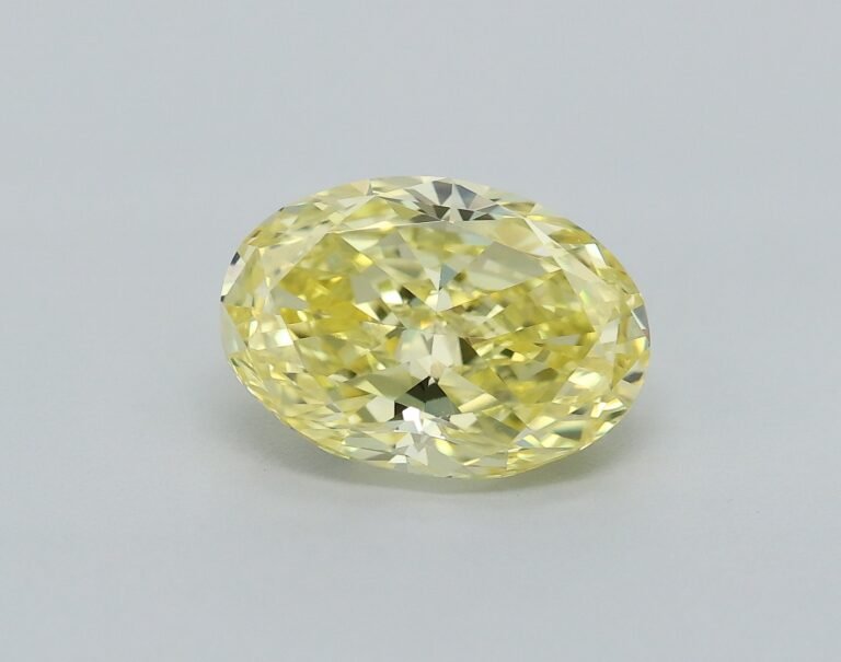 0.79 carat, Colour – Y5  Fancy Intense Yellow, Clarity – VVS1, Shape – Modified Oval,  BDM