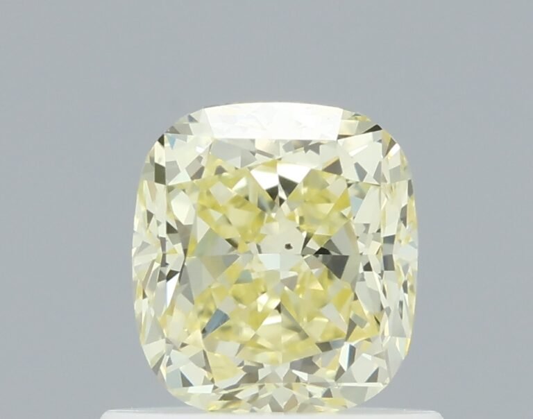 0.83 carat, Colour – Y2  Fancy Light Yellow, Clarity – SI1, Shape – Modified Cushion,  BDM
