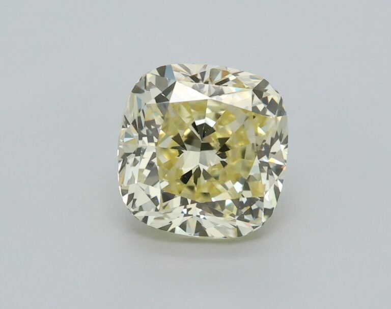 0.91 carat, Colour – Y2  Fancy Light Yellow, Clarity – VVS2, Shape – Modified Cushion,  BDM