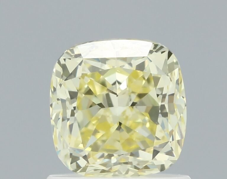 1.11 carat, Colour – Y2  Fancy Light Yellow, Clarity – VS2, Shape – Modified Cushion,  BDM