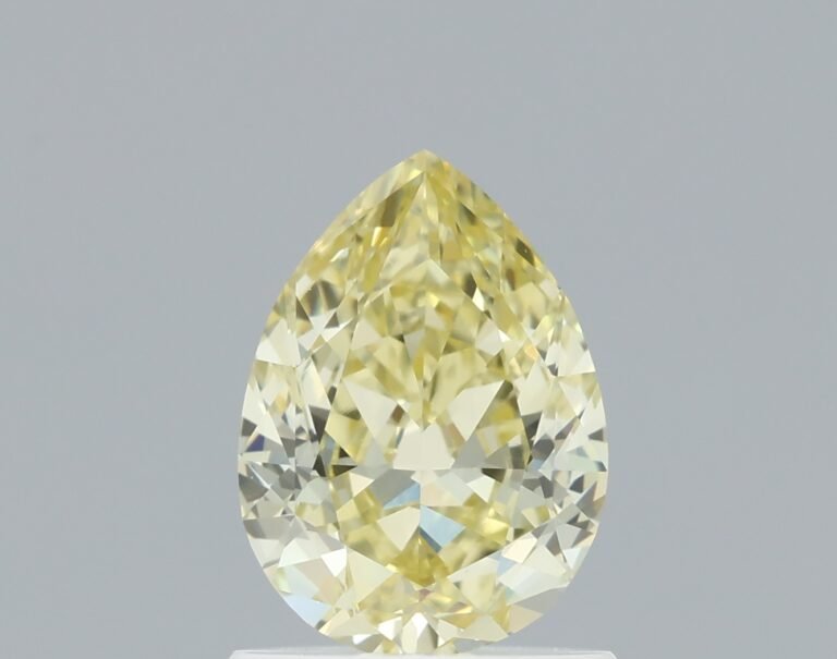 0.90 carat, Colour – Y4  Fancy Yellow, Clarity – VS1, Shape – Modified Pear,  BDM