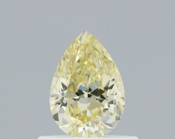 0.59 carat, Colour - Y4  Fancy Yellow, Clarity - VVS2, Shape - Modified Pear,  BDM