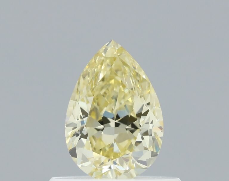 0.59 carat, Colour – Y4  Fancy Yellow, Clarity – VVS2, Shape – Modified Pear,  BDM