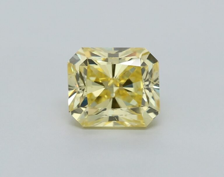 0.69 carat, Colour – Y5  Fancy Intense Yellow, Clarity – SI2, Shape – Rectangular Radiant,  BDM