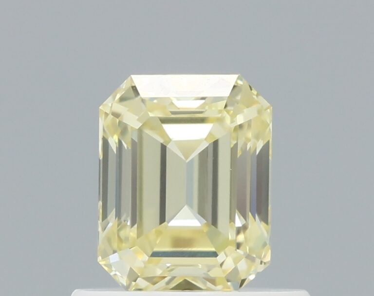 0.69 carat, Colour – Y3  Fancy Yellow, Clarity – VVS1, Shape – Emerald,  BDM