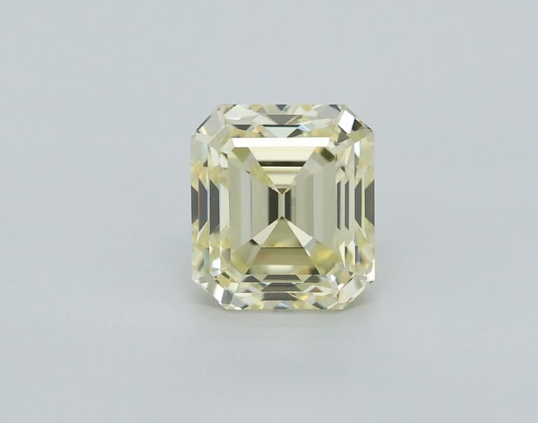 0.61 carat, Colour – Y1  Fancy Light Yellow, Clarity – VVS2, Shape – Rectangular Emerald,  BDM