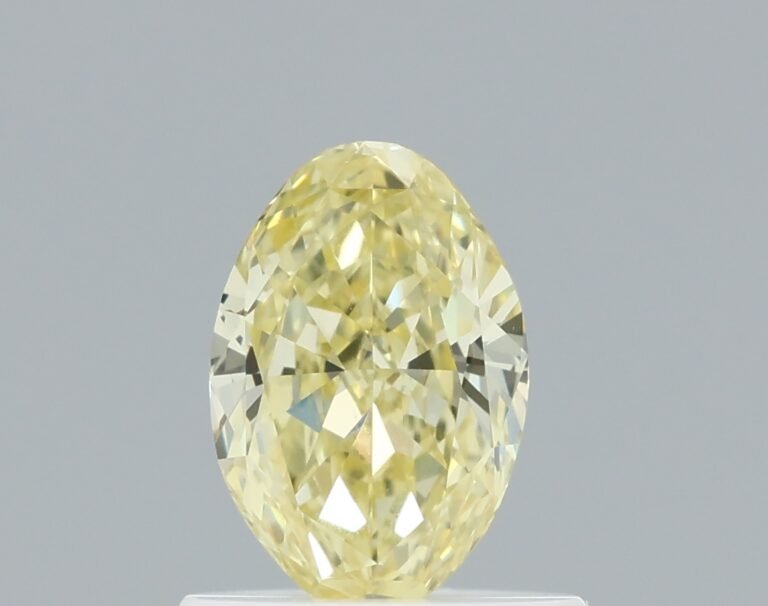 0.63 carat, Colour – Y4  Fancy Yellow, Clarity – IF, Shape – Modified Oval,  BDM