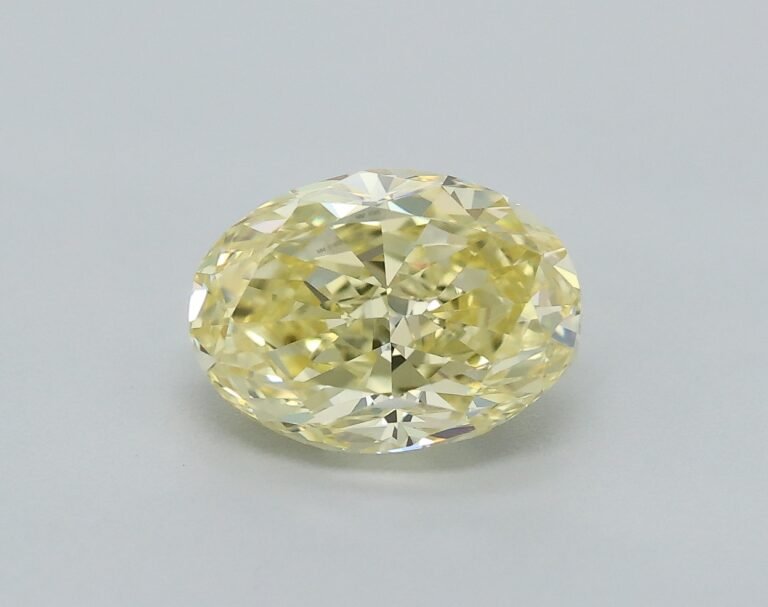 0.63 carat, Colour – Y4  Fancy Yellow, Clarity – VVS2, Shape – Modified Oval,  BDM