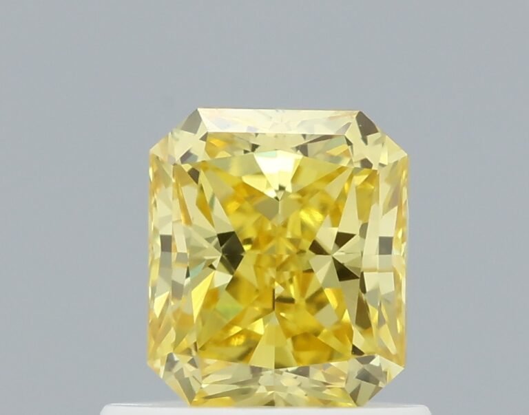 0.84 carat, Colour – Y7  Fancy Vivid Yellow, Clarity – IF, Shape – Modified Radiant,  BDM