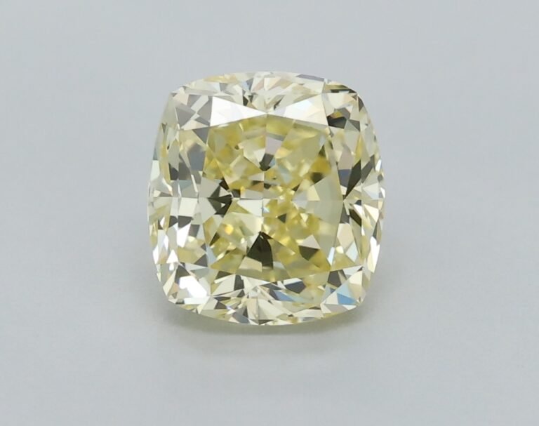0.54 carat, Colour – Y3  Fancy Yellow, Clarity – VS2, Shape – Modified Cushion,  BDM