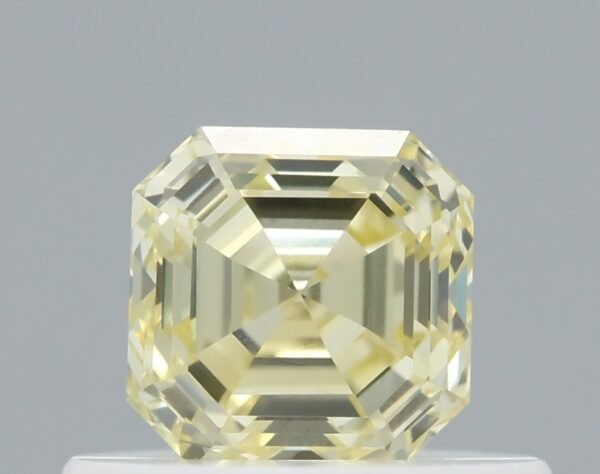 0.46 carat, Colour - Y3  Fancy Yellow, Clarity - VVS1, Shape - Square Emerald,  BDM