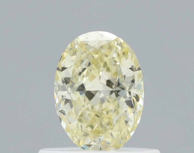 0.56 carat, Colour – Y3  Fancy Yellow, Clarity – VS1, Shape – Modified Oval,  BDM