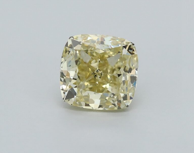 0.65 carat, Colour – Y2  Fancy Light Yellow, Clarity – VS2, Shape – Modified Cushion,  BDM