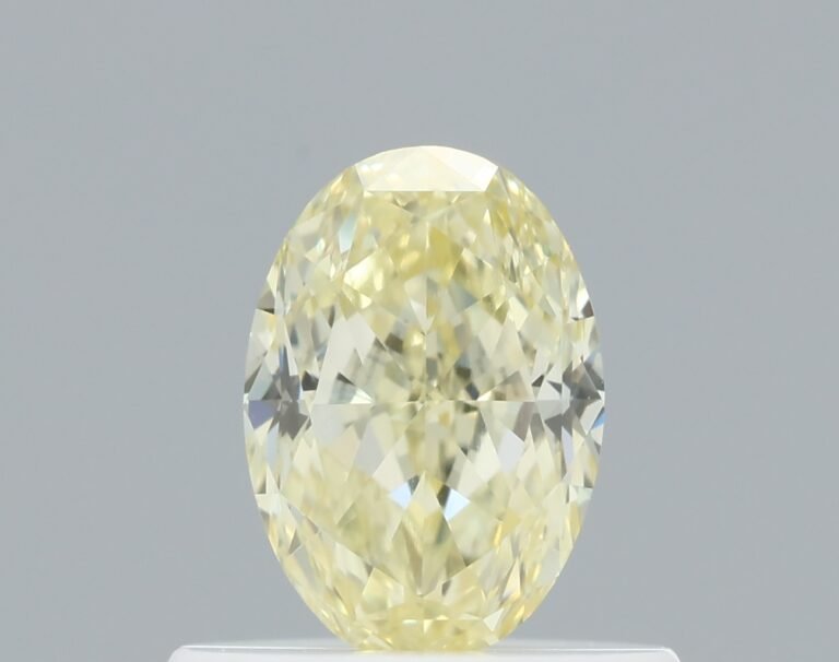0.57 carat, Colour – Y3  Fancy Yellow, Clarity – VS1, Shape – Modified Oval,  BDM