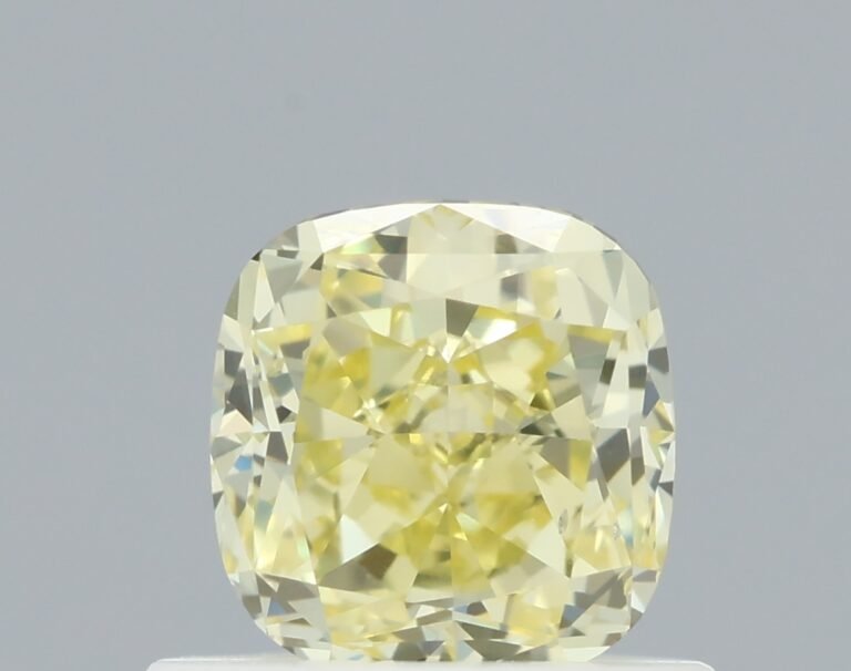0.71 carat, Colour – Y3  Fancy Yellow, Clarity – SI1, Shape – Modified Cushion,  BDM